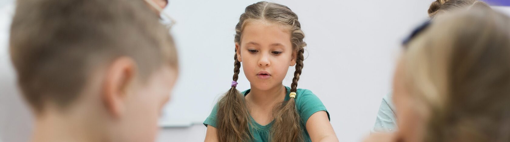 young-teacher-doing-her-class-with-children