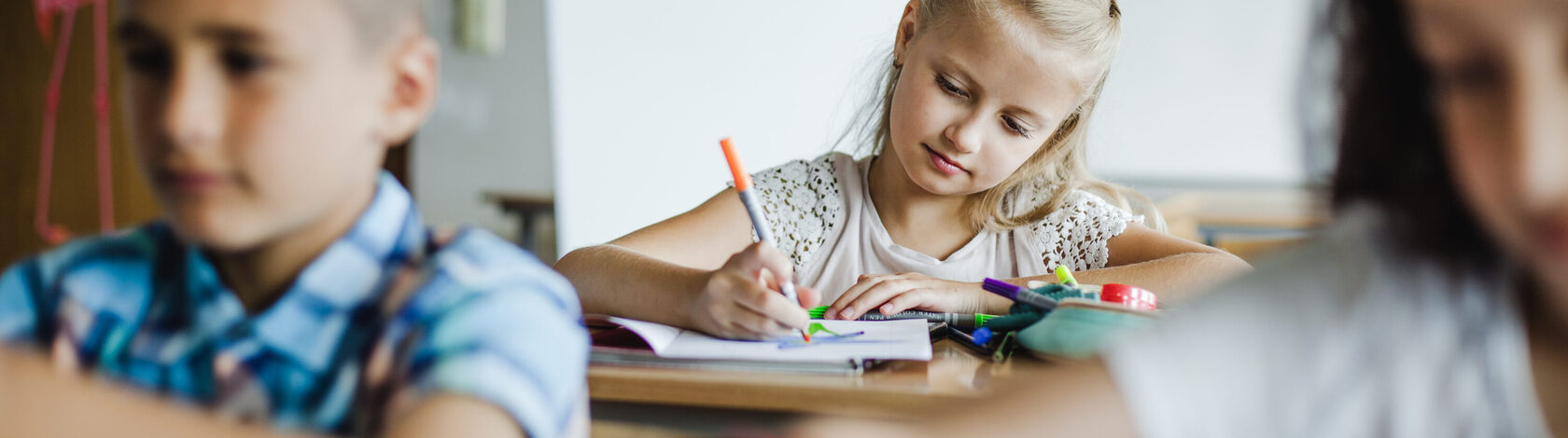 children-sitting-classroom-studying