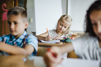 children-sitting-classroom-studying